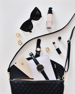 A Flat Lay showing the contents of a handbag